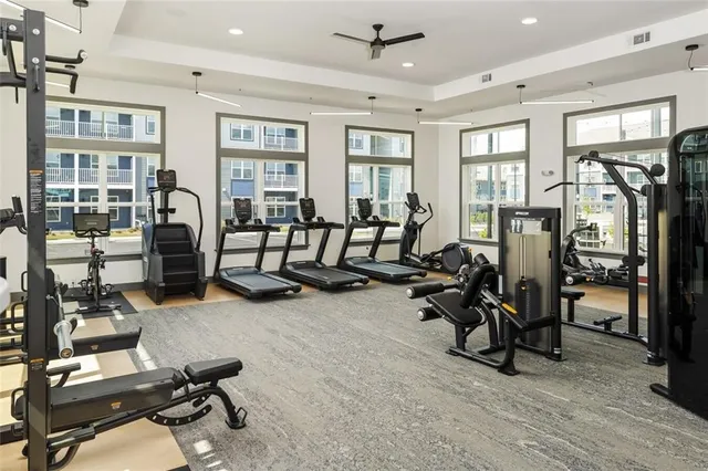 a view of a house with backyard porch and sitting area