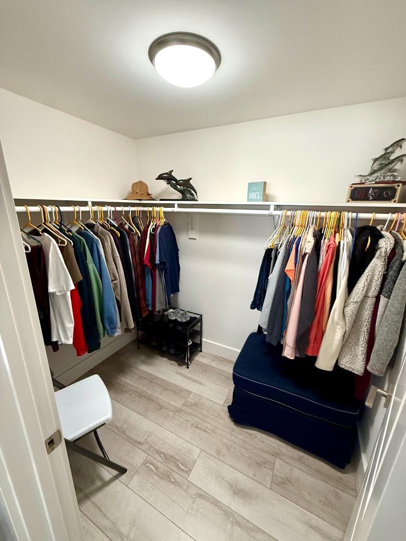 8 Lighthouse Road, Unit 8 Half Moon Bay, CA 94019 - Photo 14 of 21 a view of walk in closet with clothes and shoes