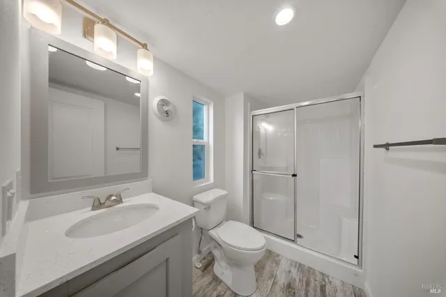 a view of an empty room with a closet