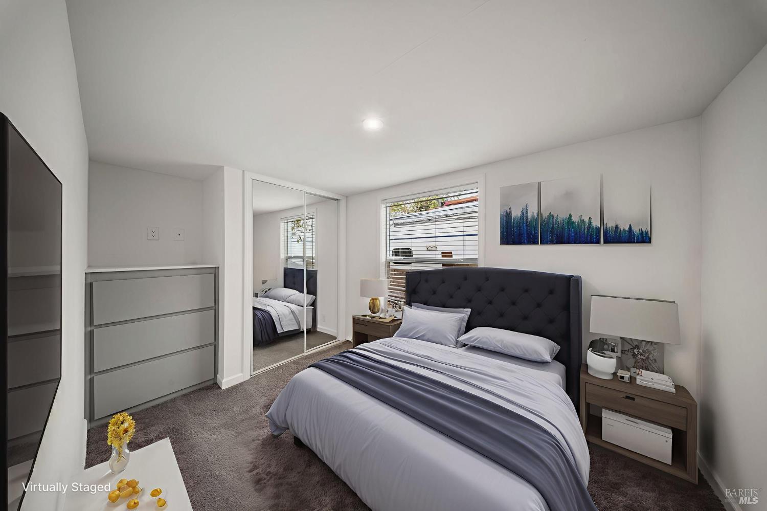 742 Francisco Boulevard West, Unit B12 San Rafael, CA 94901 - Photo 14 of 16 a bedroom with a bed and a window