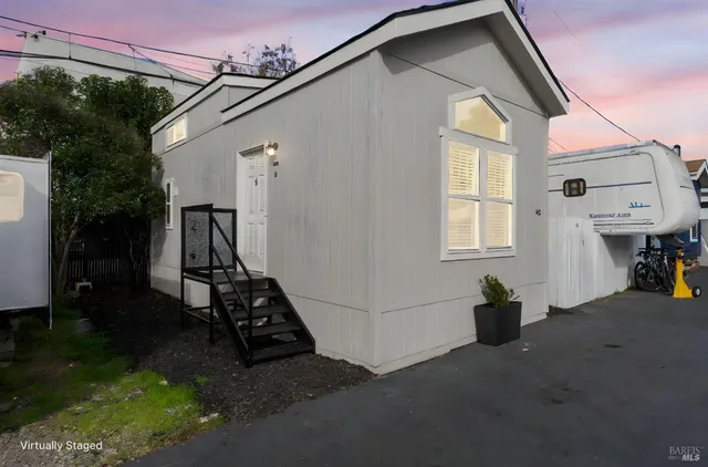 a view of a backyard of the house