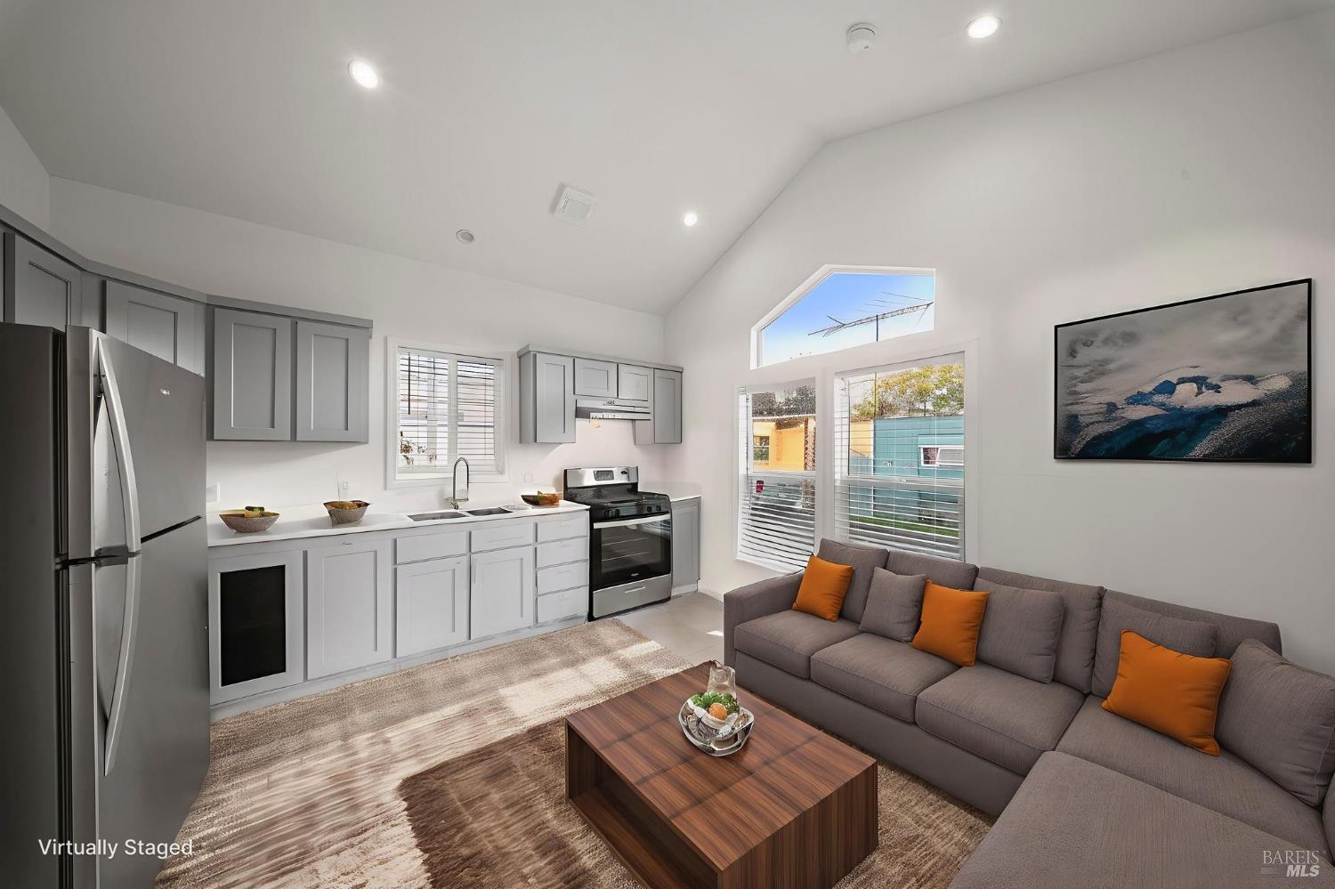 742 Francisco Boulevard West, Unit B12 San Rafael, CA 94901 - Photo 7 of 16 a living room with furniture kitchen view and a refrigerator