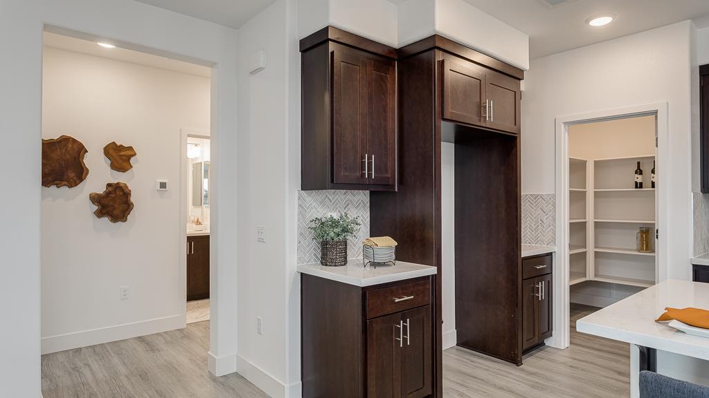 338 Line Street Hayward, CA 94544 - Photo 16 of 25 a kitchen with a refrigerator and cabinets