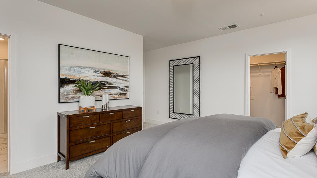 338 Line Street Hayward, CA 94544 - Photo 18 of 25 a bedroom with a bed and a dresser