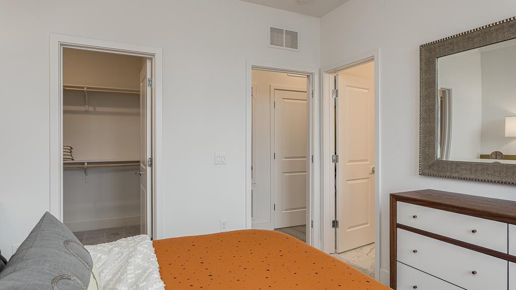 338 Line Street Hayward, CA 94544 - Photo 23 of 25 a bedroom with a bed and a dresser