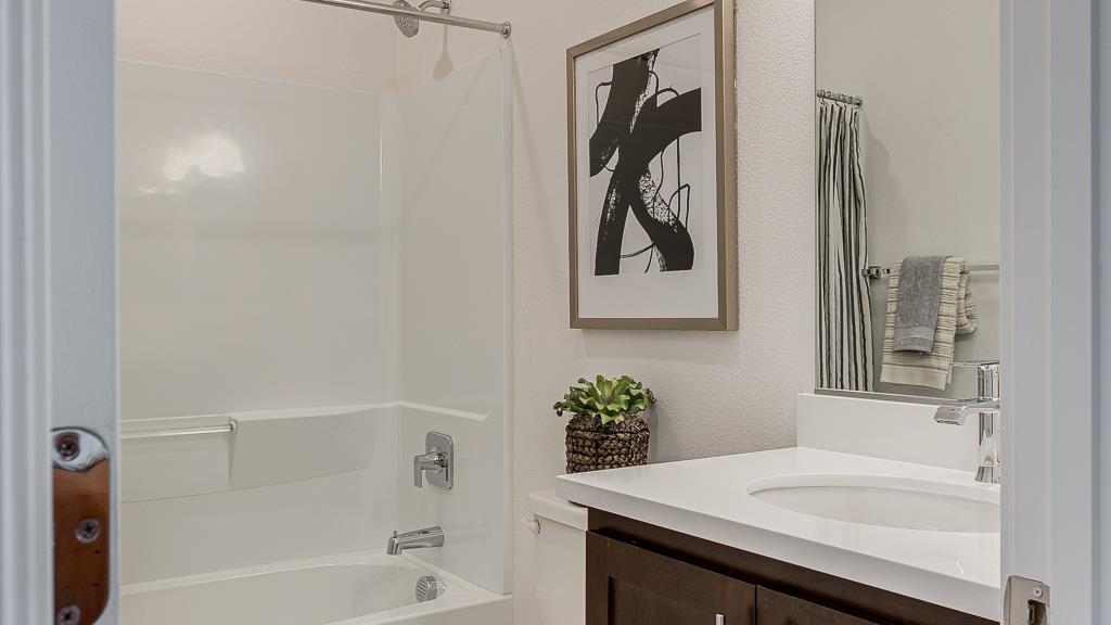 338 Line Street Hayward, CA 94544 - Photo 24 of 25 a bathroom with a sink and a bathtub