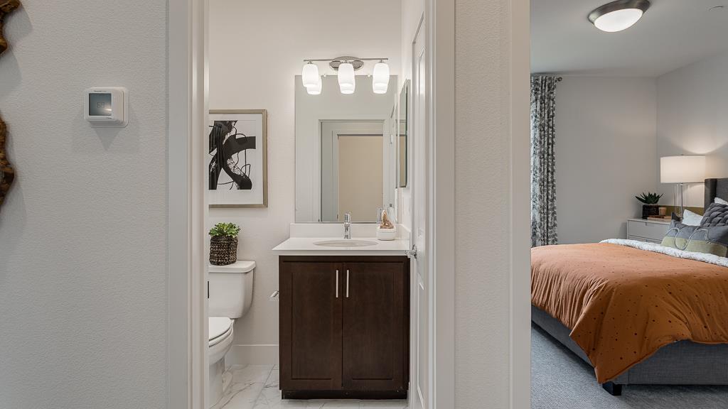 338 Line Street Hayward, CA 94544 - Photo 25 of 25 a en suite bathroom with a sink and mirror