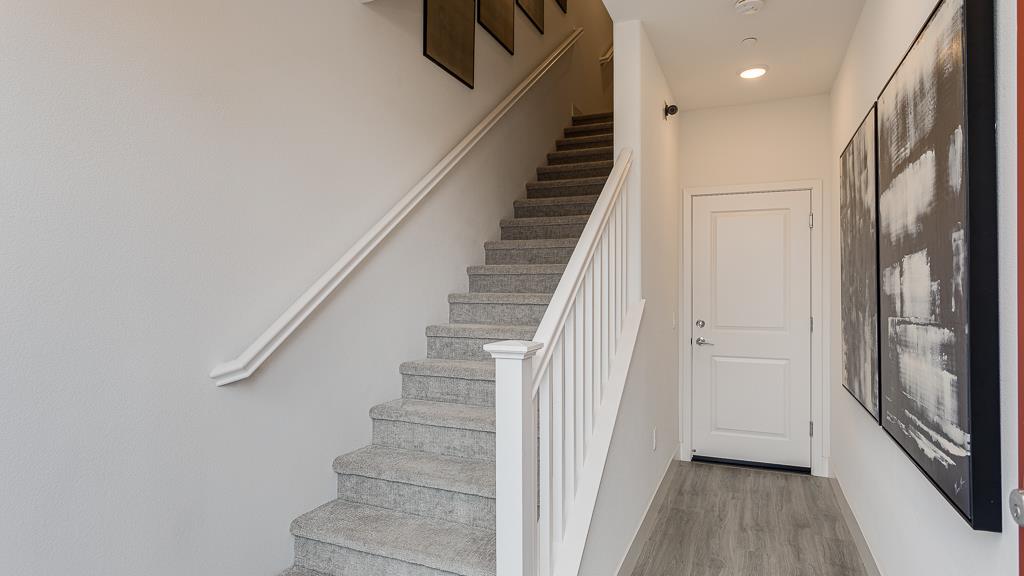 338 Line Street Hayward, CA 94544 - Photo 5 of 25 a view of entryway with wooden floor and stairs