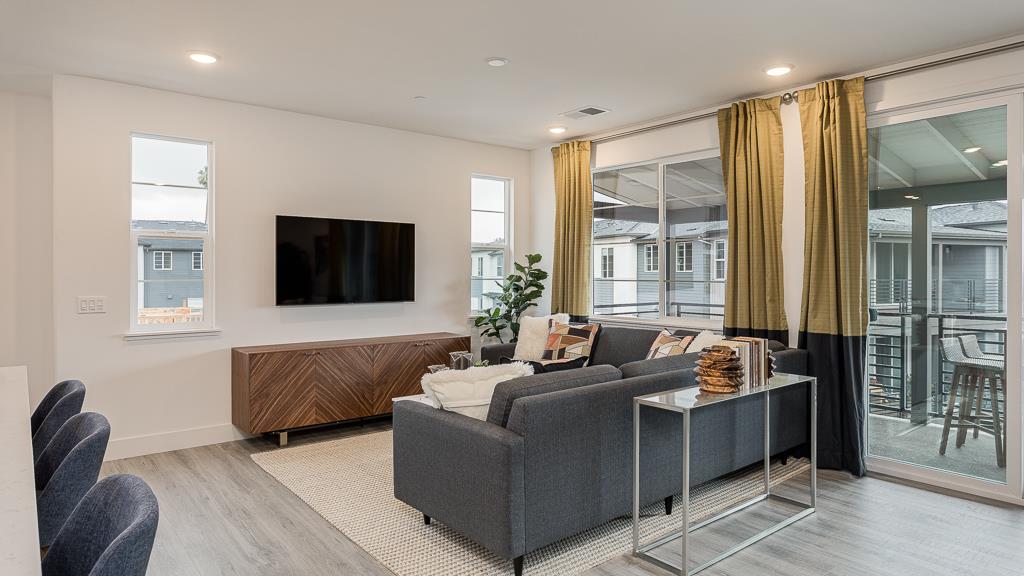 338 Line Street Hayward, CA 94544 - Photo 8 of 25 a living room with furniture and a flat screen tv