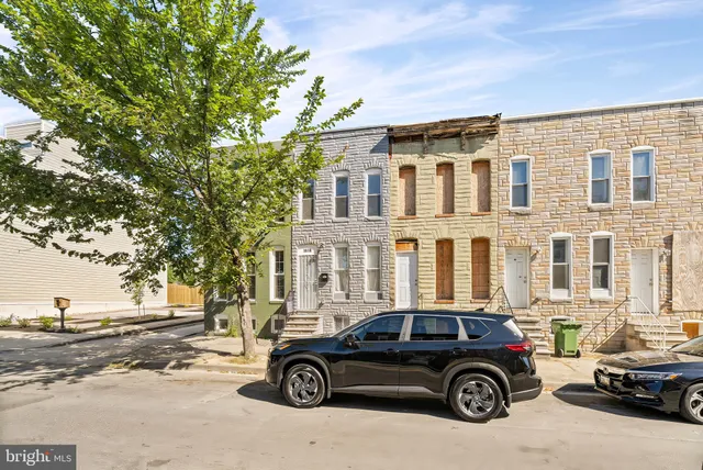 a car parked in front of a building