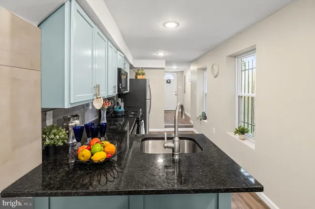 a view of a living room and dining room
