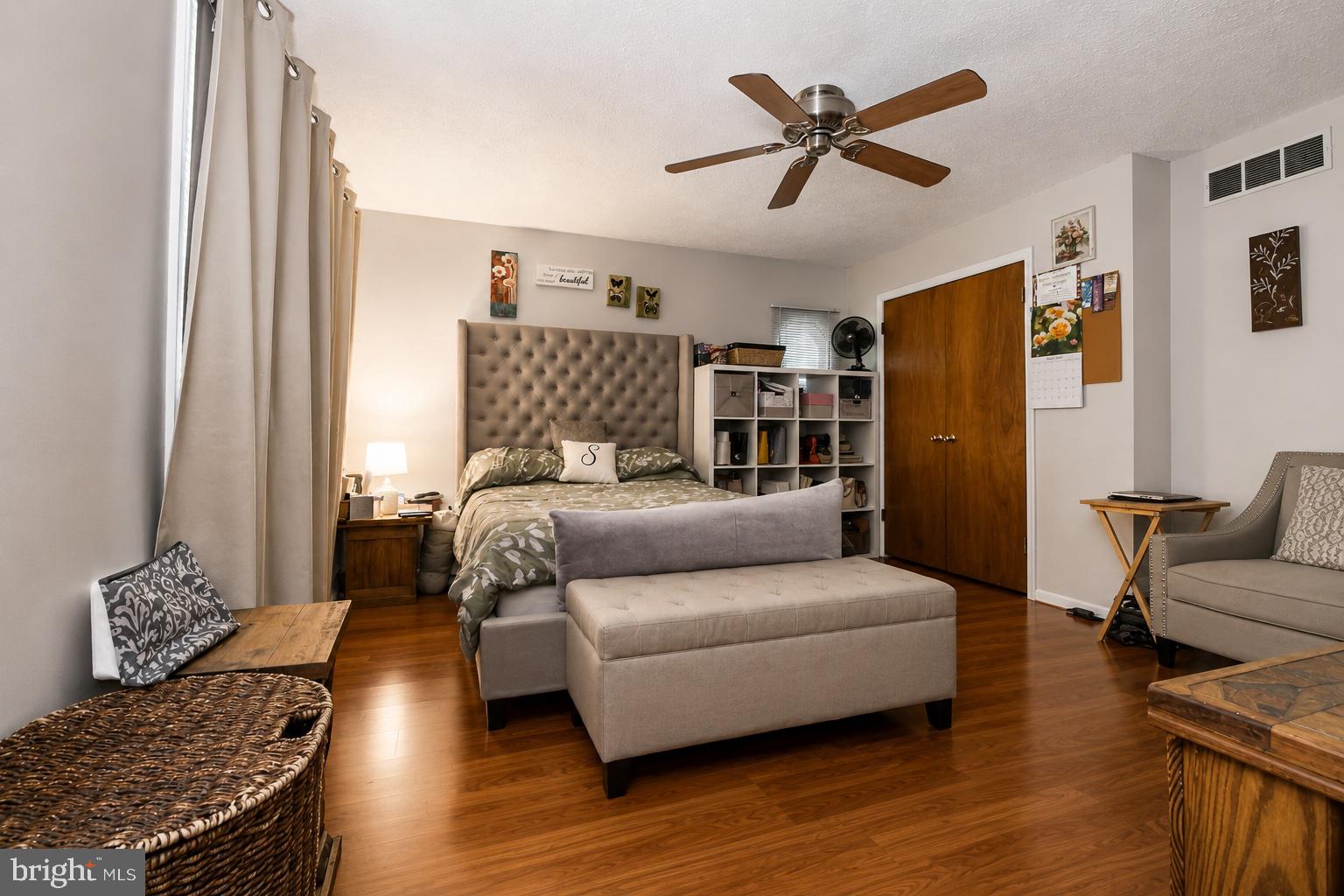 8121 Elizabeth Road Pasadena, MD 21122 - Photo 10 of 27 a living room with furniture and wooden floor