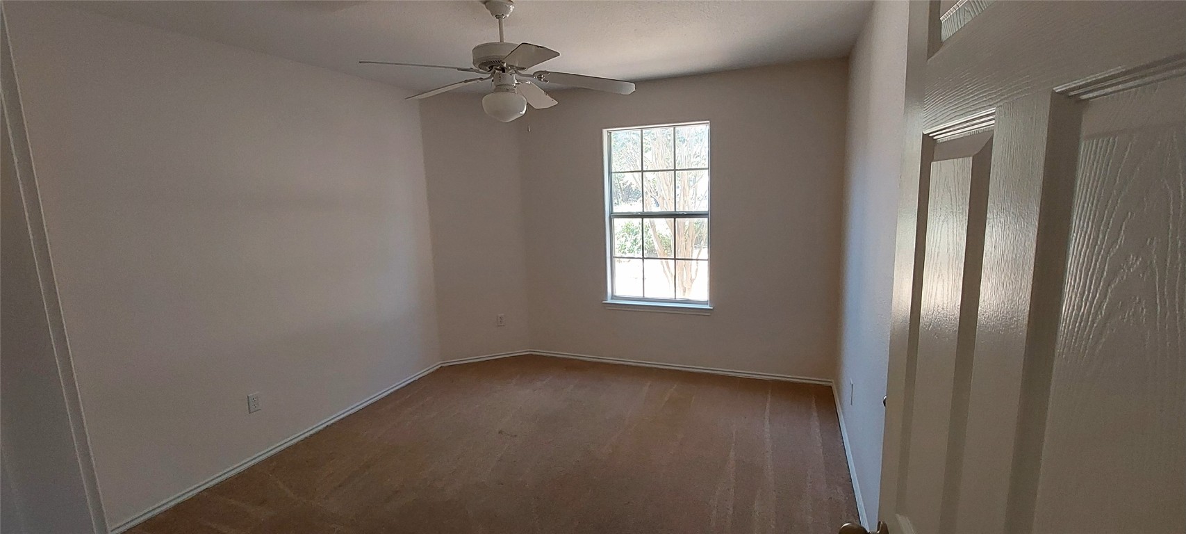 4 Memory Lane Wimberley, TX 78676 - Photo 12 of 20 an empty room with windows and fan