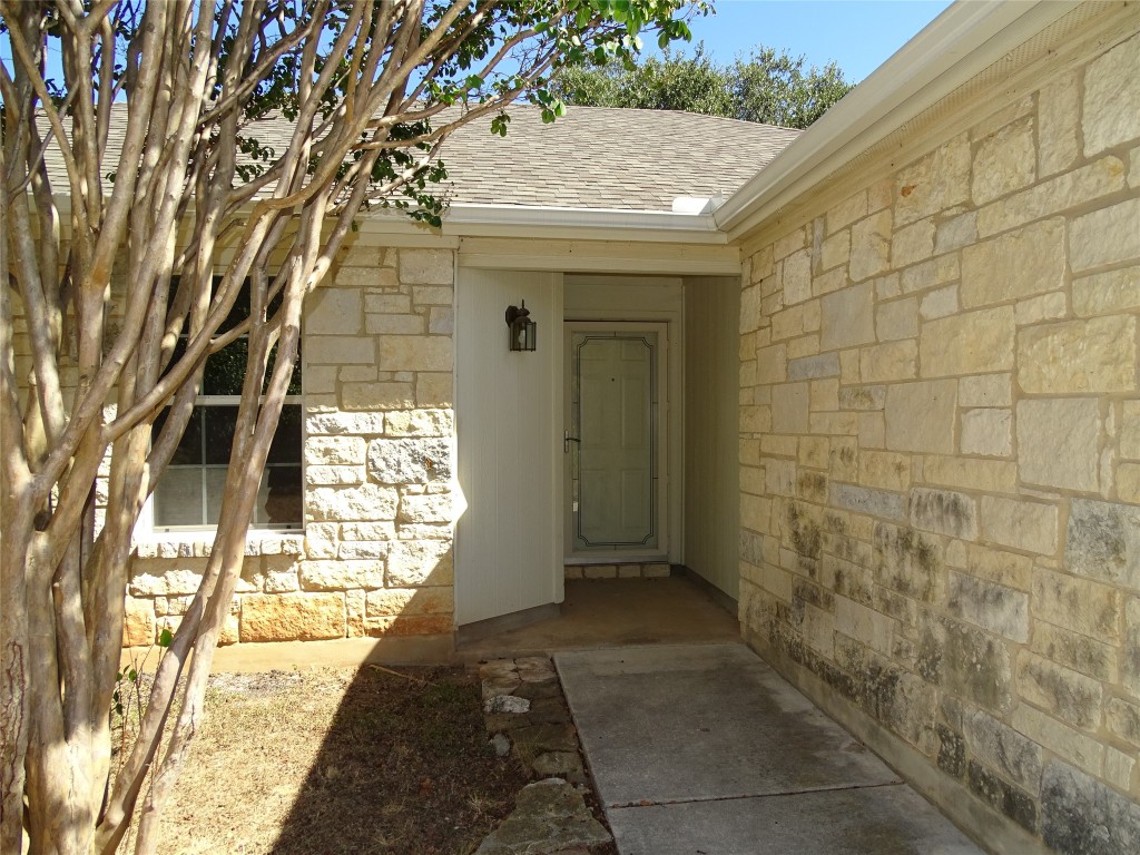 4 Memory Lane Wimberley, TX 78676 - Photo 2 of 20 a view of a pathway both side of building