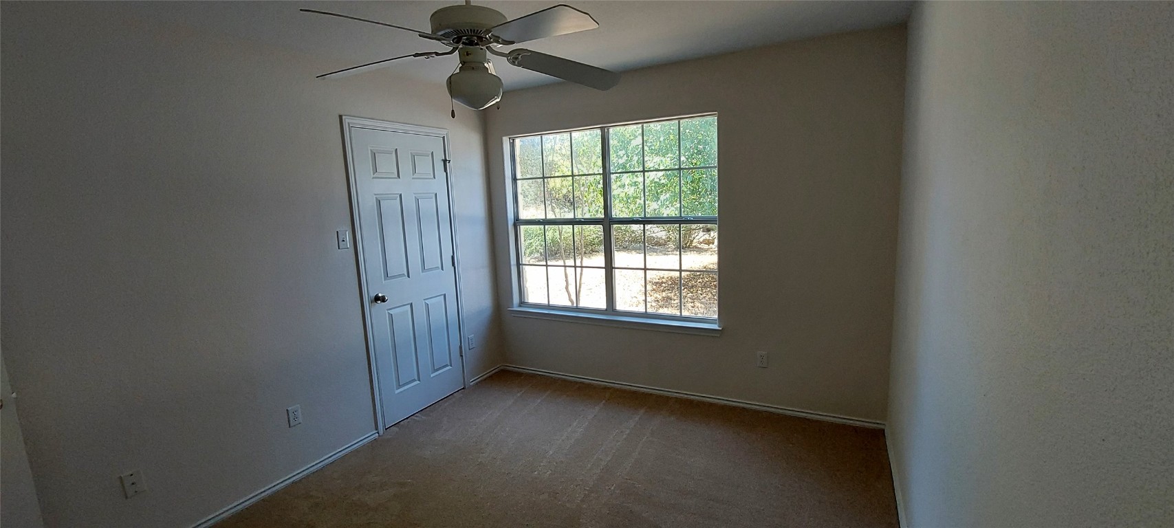 4 Memory Lane Wimberley, TX 78676 - Photo 9 of 20 a view of an empty room with a window