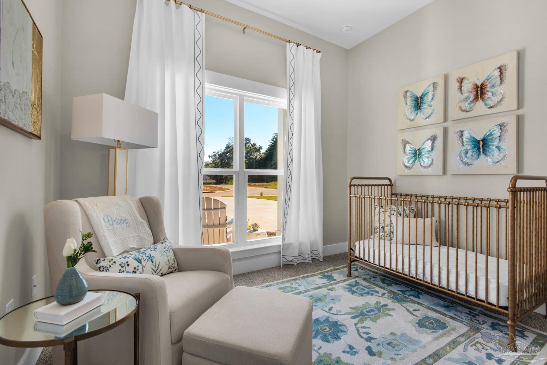 5912 Greenfield Street Pace, FL 32571 - Photo 20 of 47 a living room with furniture and a window with outer view