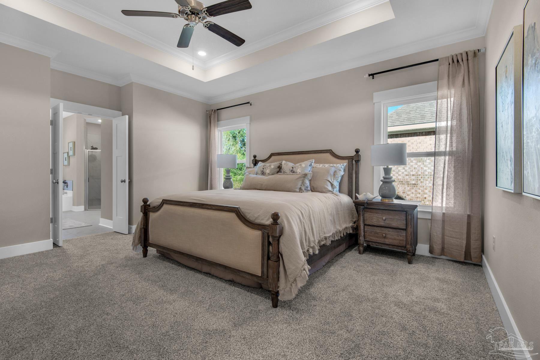 5912 Greenfield Street Pace, FL 32571 - Photo 39 of 47 a bedroom with a bed and a window