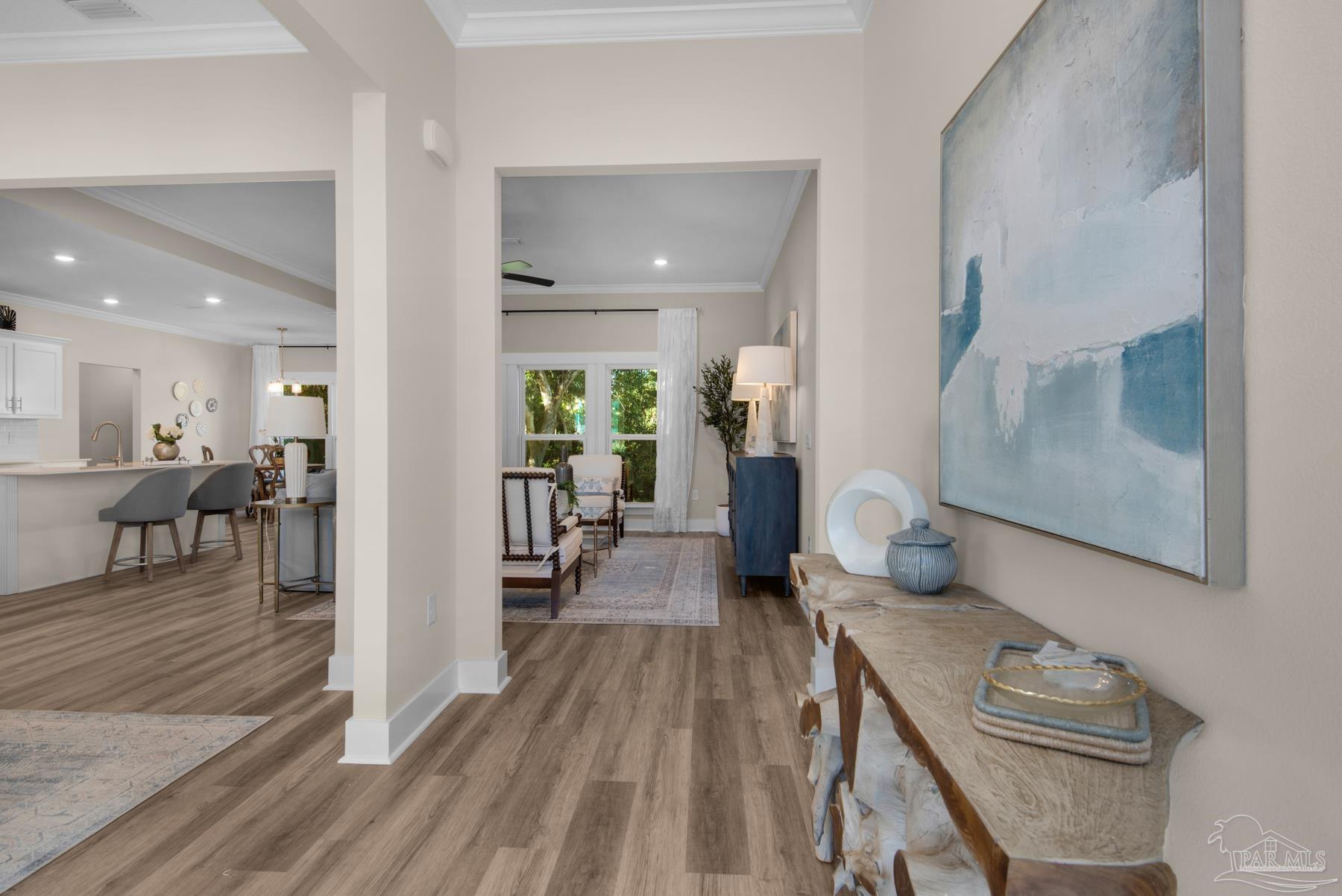 5912 Greenfield Street Pace, FL 32571 - Photo 5 of 47 a view of a living room and dining room