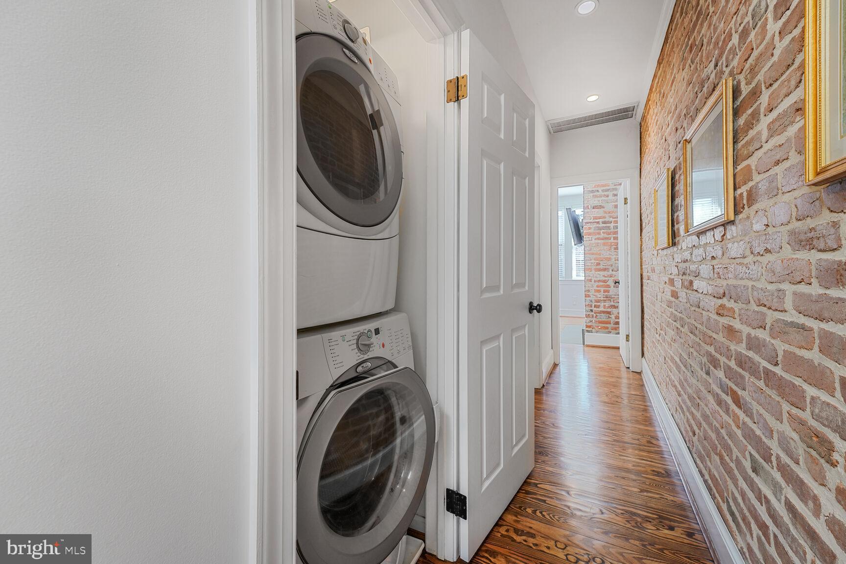 252 10th Street Northeast Washington, DC 20002 - Photo 21 of 31 a view of a hallway with washer and dryer