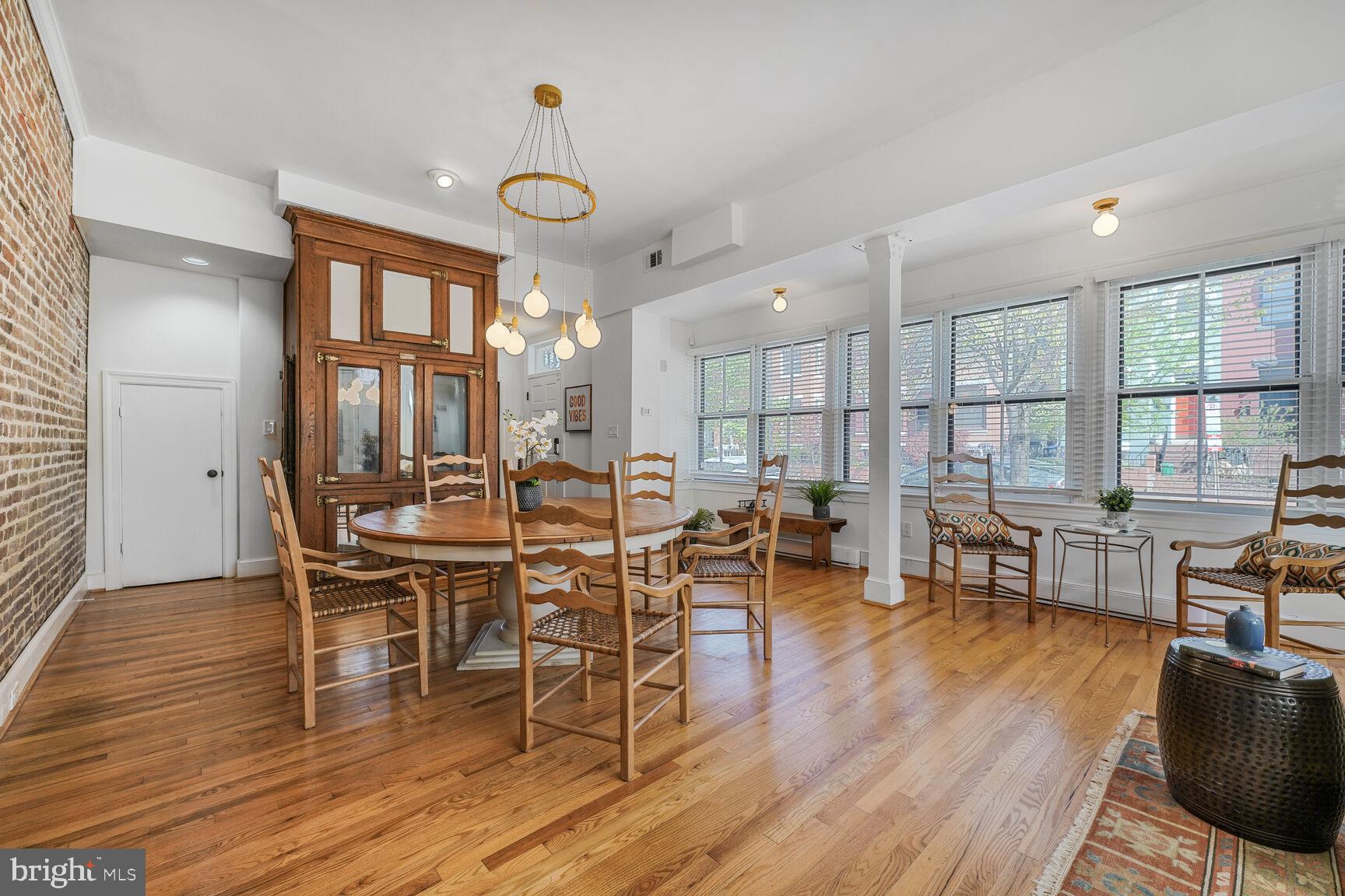 252 10th Street Northeast Washington, DC 20002 - Photo 7 of 31 a view of a dining room with furniture window and wooden floor