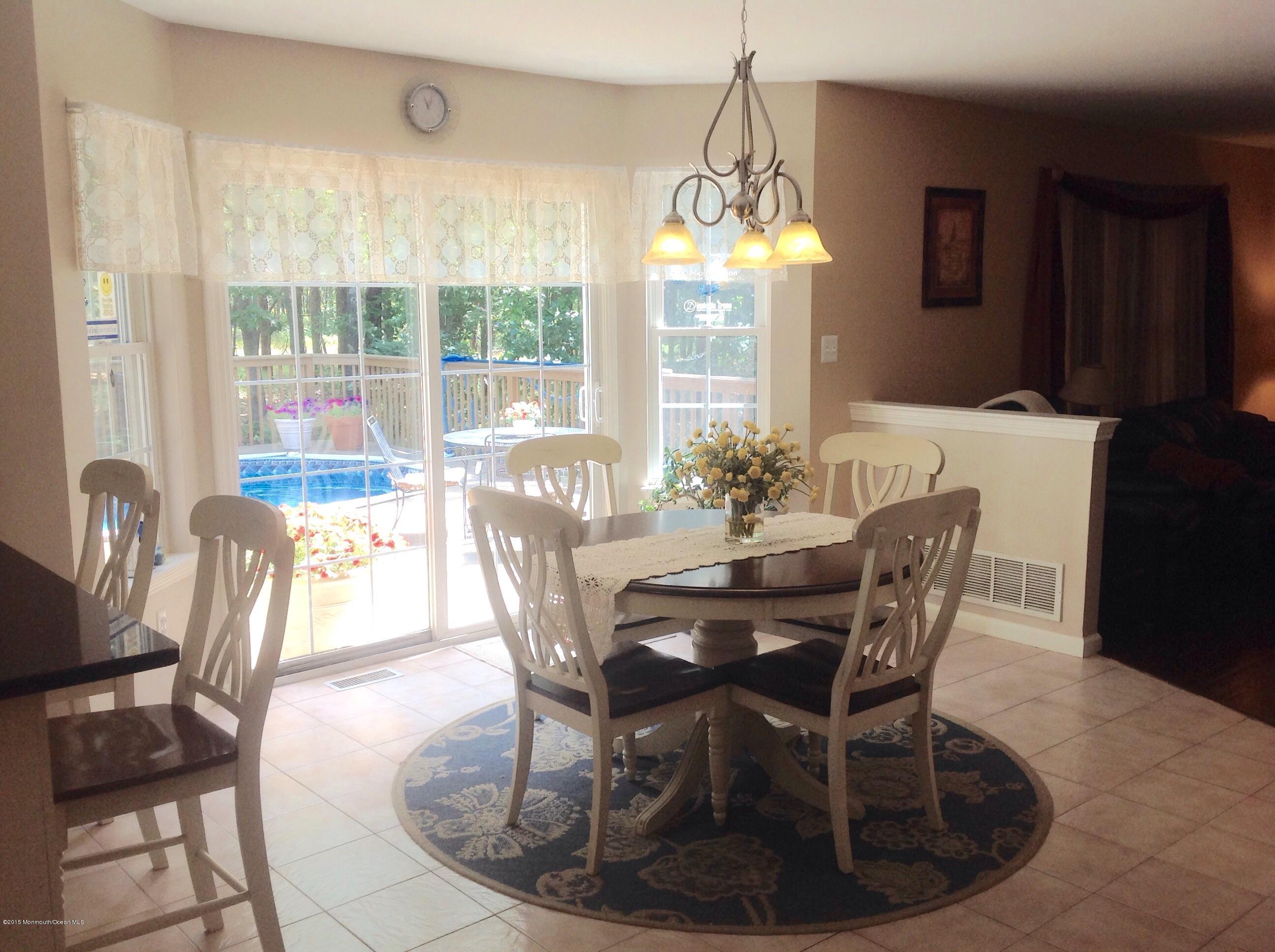811 Cassville Road Jackson, NJ 08527 - Photo 54 of 88 a view of a dining room with furniture window and outside view