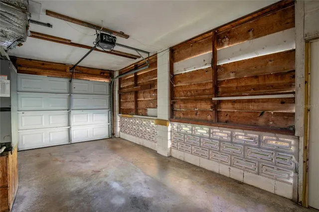 a view of an empty room with cabinet