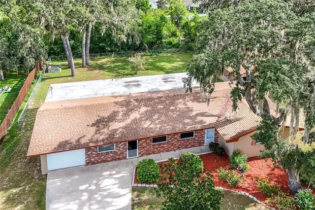 a view of a backyard with a small house