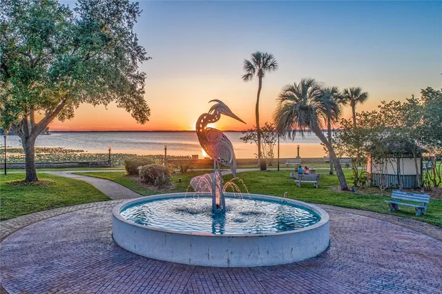 a view of a lake with a yard