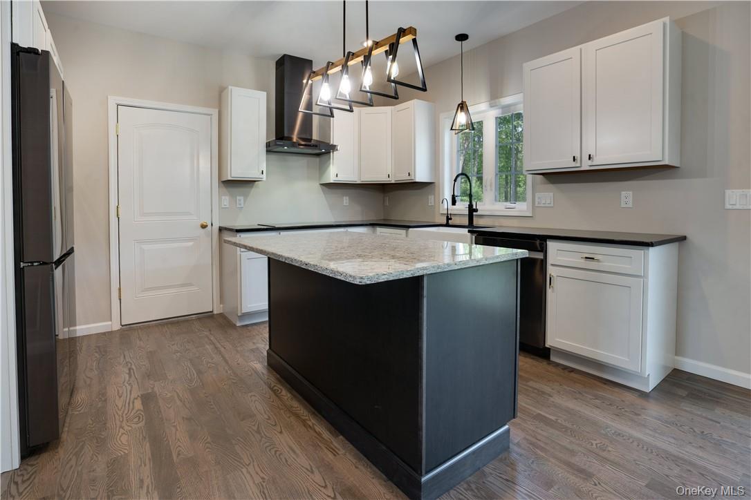 991 Freedom Road Pleasant Valley, NY 12569 - Photo 5 of 23 a kitchen with a sink and cabinets