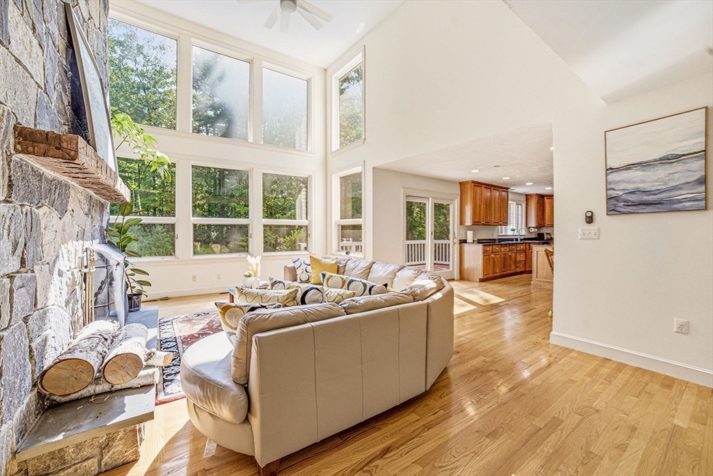 85 Cedarwood Road Boxborough, MA 01719 - Photo 17 of 41 a living room with furniture and large windows