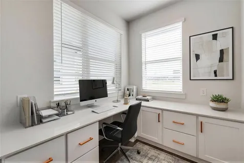 a view of a kitchen with a window