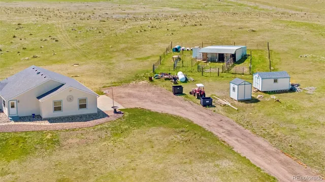 a view of a terrace with chairs