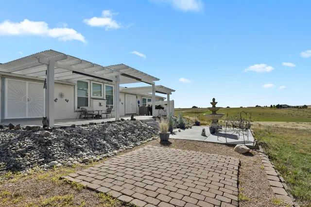 a garden view with a play ground