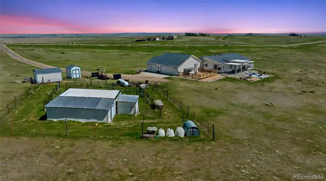 a view of a lake with a yard
