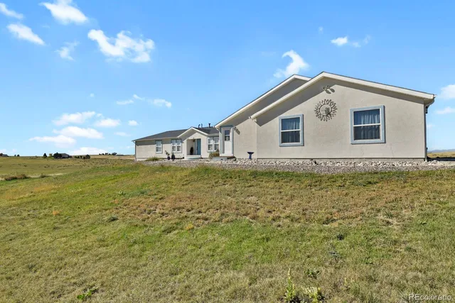 a house view with a garden space