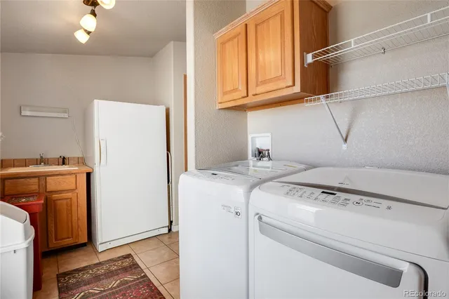 a view of a porch with furniture and garden view