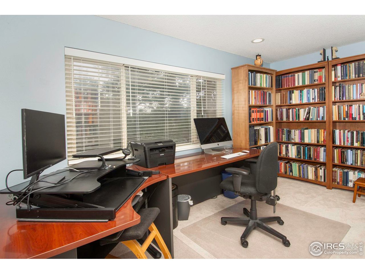 750 West Moorhead Circle, Unit A Boulder, CO 80305 - Photo 15 of 35 a view of a workspace with furniture and a window