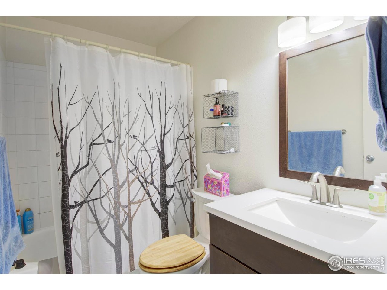 750 West Moorhead Circle, Unit A Boulder, CO 80305 - Photo 17 of 35 a bathroom with a sink vanity and a mirror