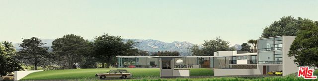 a front view of a house with a garden and plants