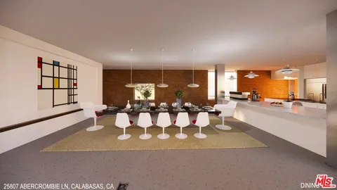 a view of a living room and dining room