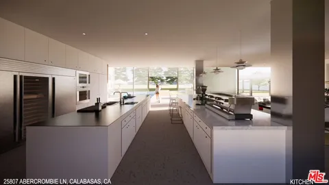 a view of a living room and kitchen with a large window