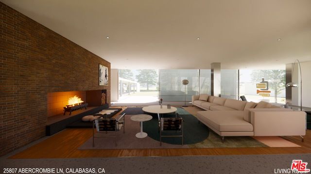 a living room with furniture dining room and a fireplace