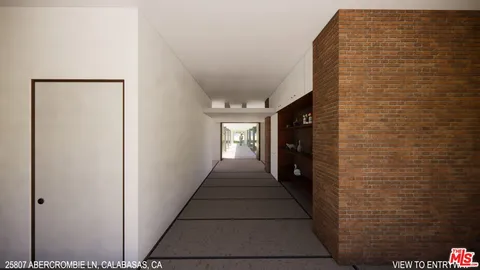 a hallway with windows