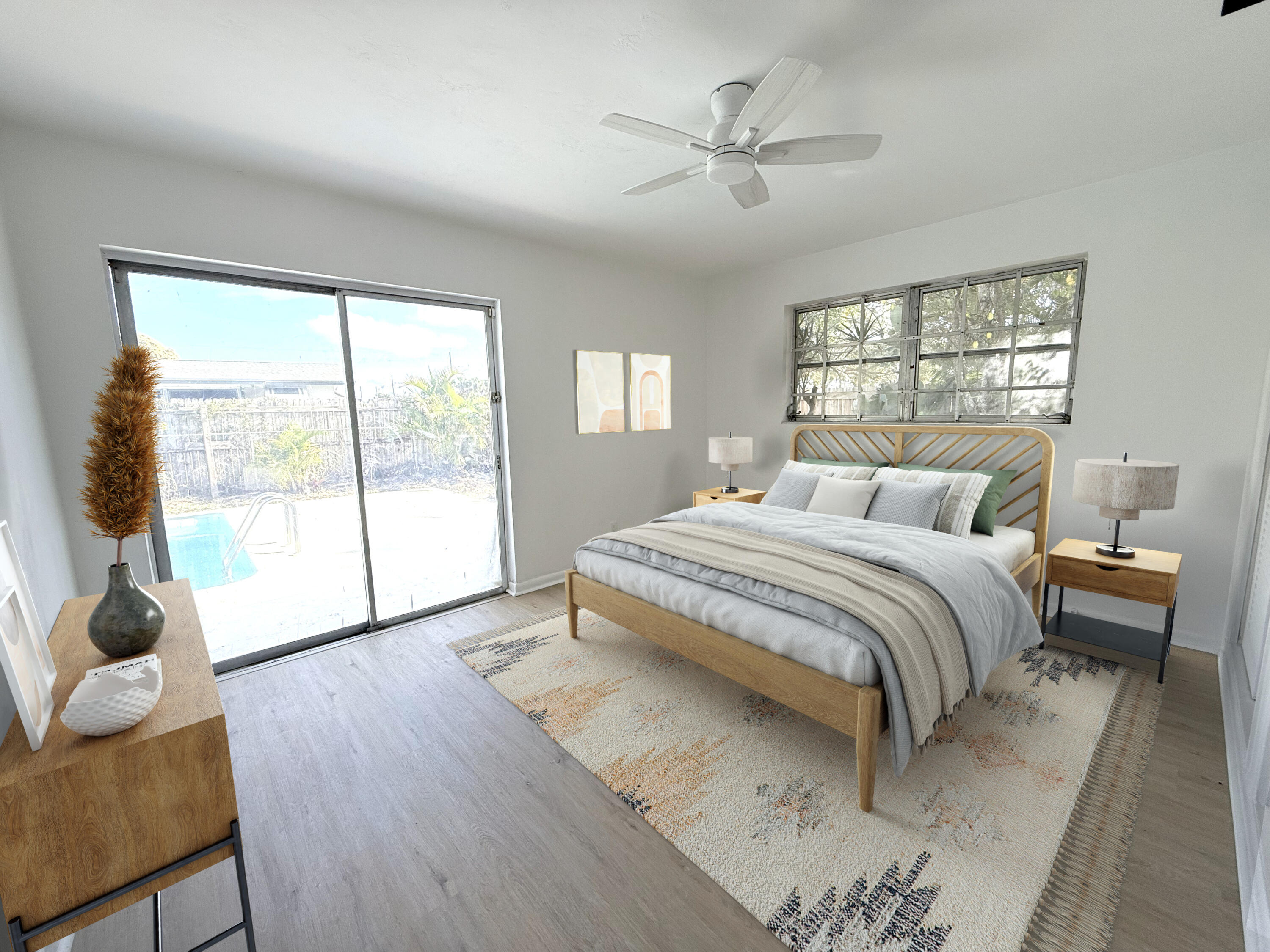 210 West 23rd Street Riviera Beach, FL 33404 - Photo 10 of 20 a bedroom with a bed and a large window