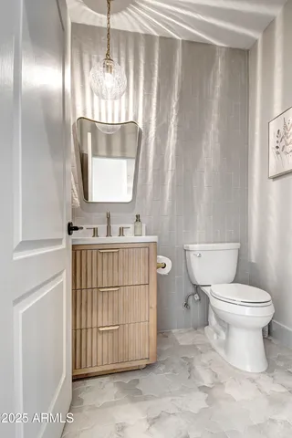 a view of a backyard with sitting area