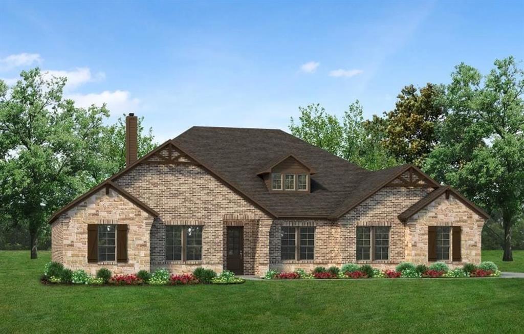 2408 Quartz Street Krum, TX 76249 - Photo 2 of 13 a front view of a house with a yard and green space
