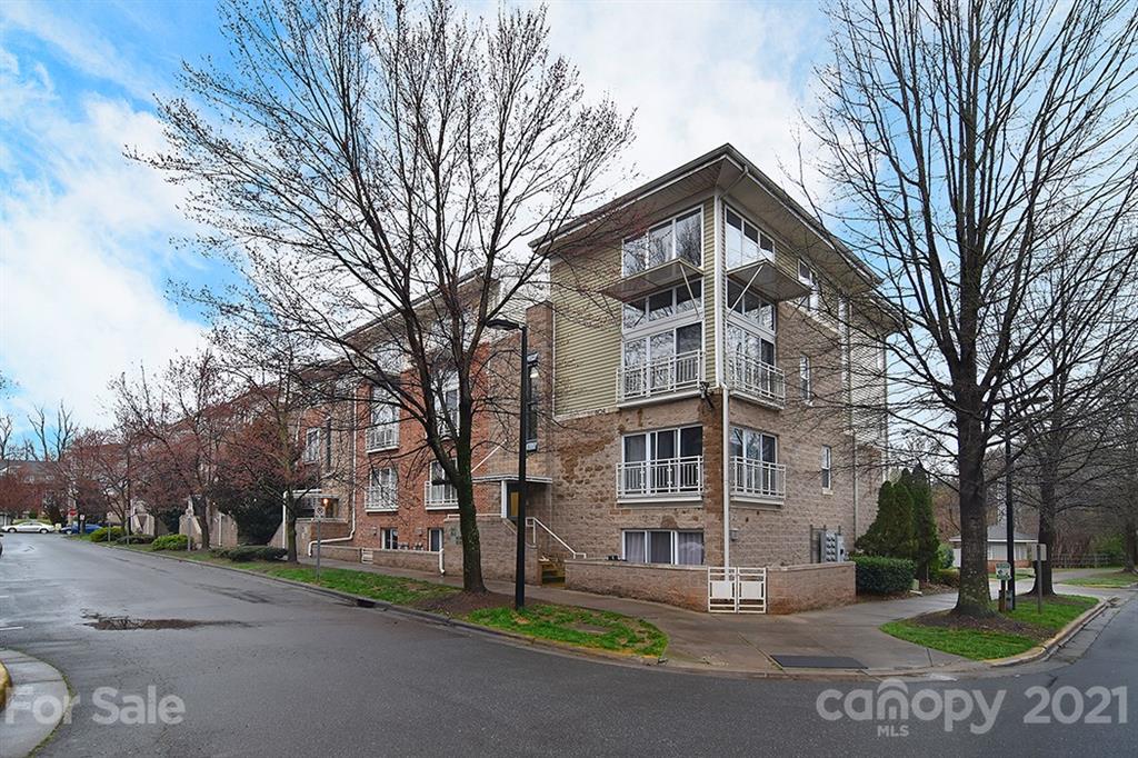 610 Raphael Place Charlotte, NC 28205 - Photo 1 of 27 a view of a building with a yard