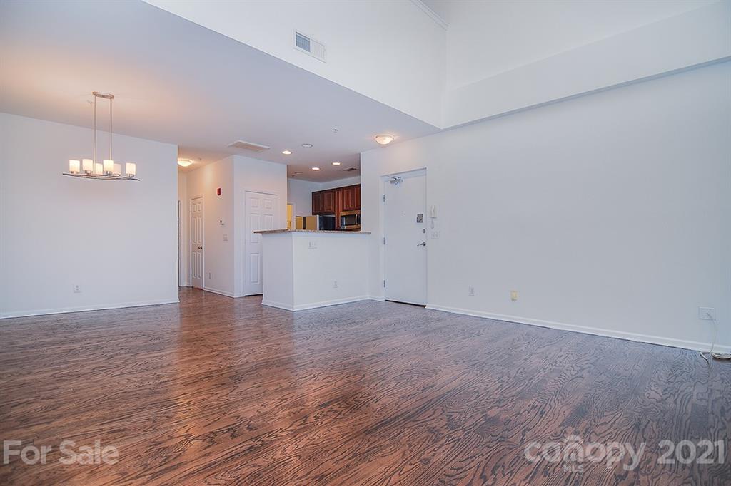 610 Raphael Place Charlotte, NC 28205 - Photo 12 of 27 a view of a kitchen with a sink and a refrigerator