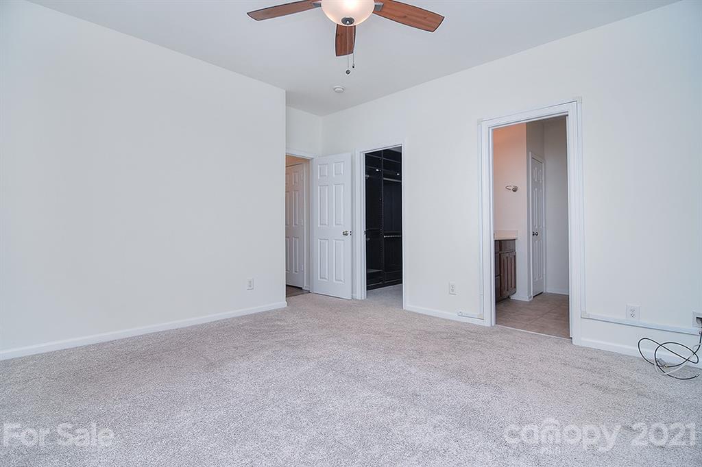 610 Raphael Place Charlotte, NC 28205 - Photo 16 of 27 a view of empty room with a ceiling fan