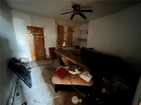 a room with furniture and air hockey table